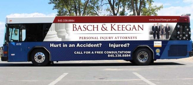 Basch & Keegan advertising poster on city bus